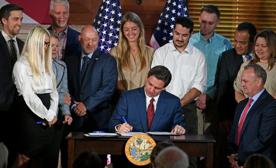 <div class="inline-image__caption"><p>Florida's Governor Ron DeSantis signs three bills into legislation, including one that bans tax dollars from being used in state colleges for diversity, equity and inclusion programs (DEI) in a sweeping measure that also places restrictions on classroom discussion of race, at New College of Florida in Sarasota, Florida on May 15, 2023.</p></div> <div class="inline-image__credit">Thomas Bender/USA Today Network via Reuters</div>