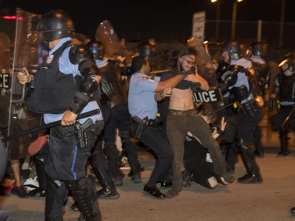 New Orleans police clash with protesters on top of the Crescent City Connection bridge Wednesday, June 3, 2020, in New Orleans during a protest over the death of George Floyd, who died May 25 after being restrained by police in Minneapolis. (Chris Granger/The Advocate via AP)