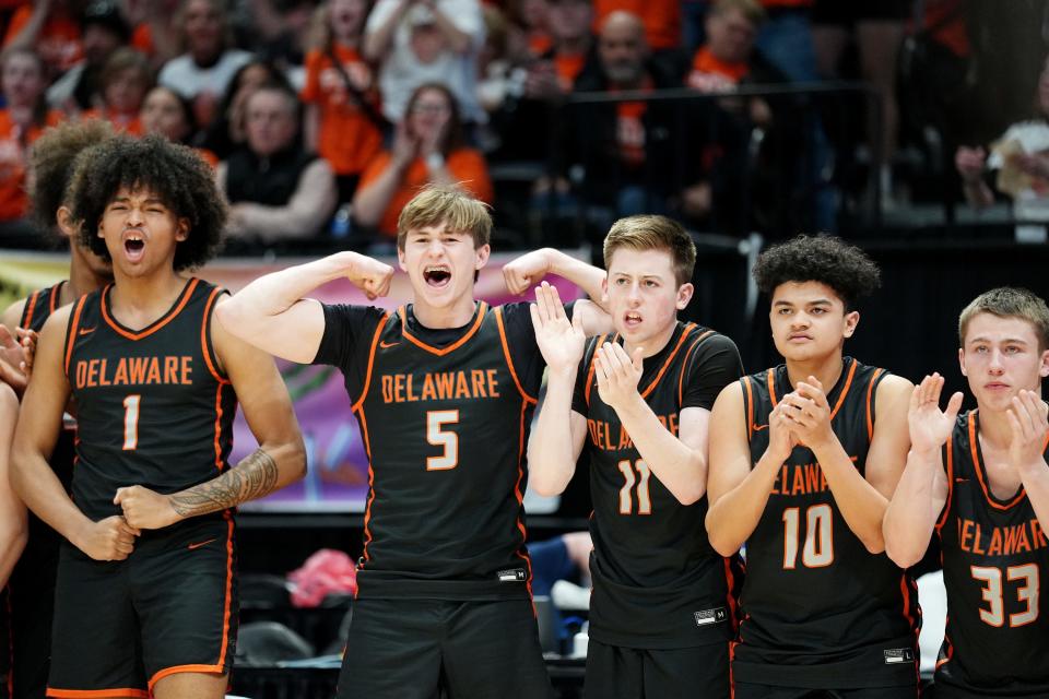 Delaware Hayes players celebrate as the team rallies against Cleveland St. Ignatius on Saturday.