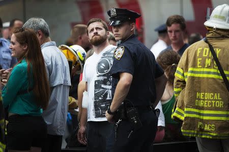 Double-decker tour buses collide in Times Square