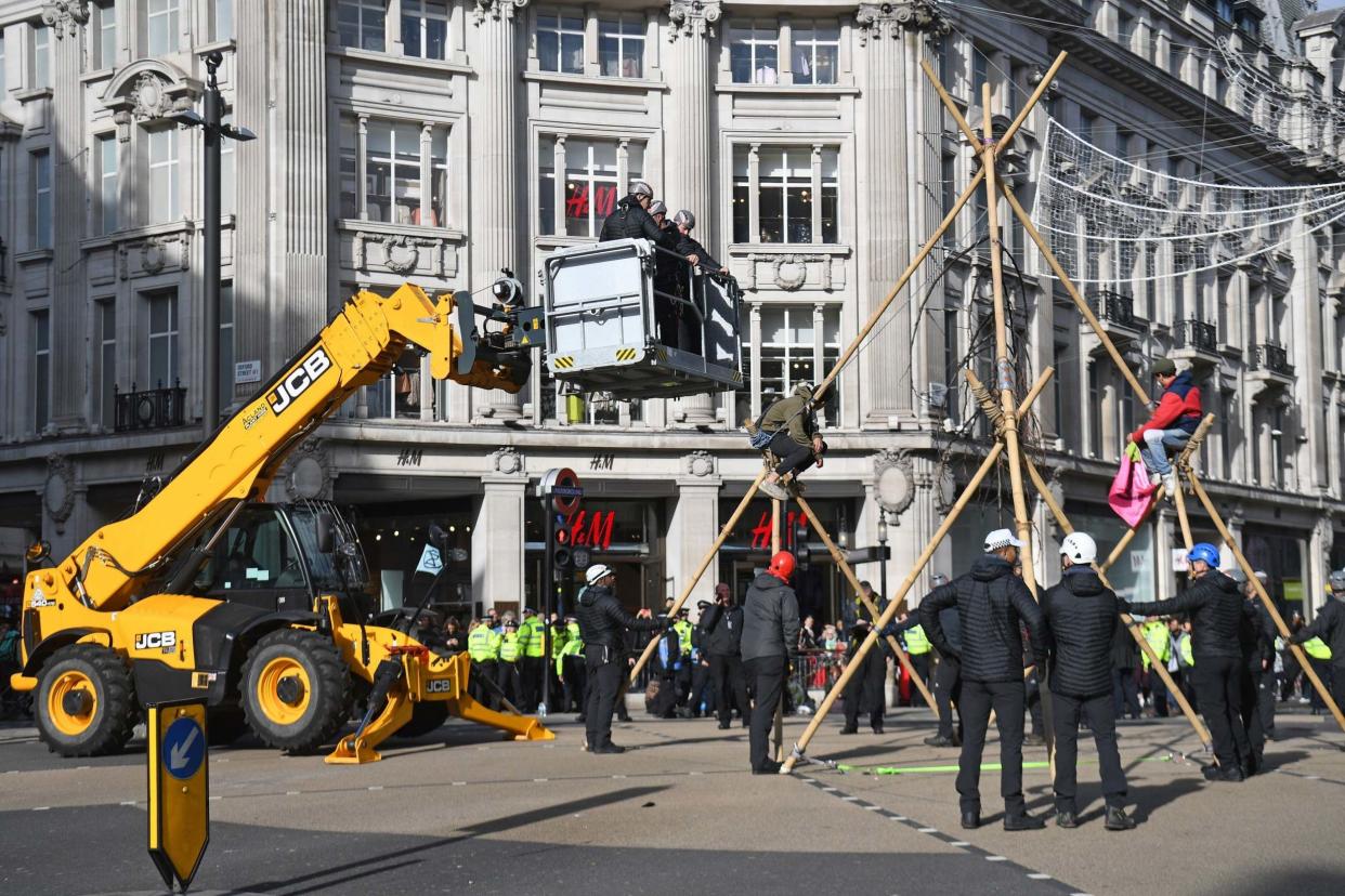 A JCB was used to remove the climate protesters: PA