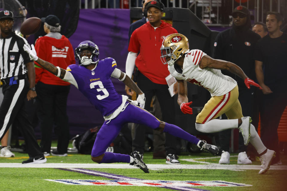 Minnesota Vikings wide receiver Jordan Addison (3) looks to catch a pass in front of San Francisco 49ers cornerback Charvarius Ward (7) during the second half of an NFL football game, Monday, Oct. 23, 2023, in Minneapolis. (AP Photo/Bruce Kluckhohn)