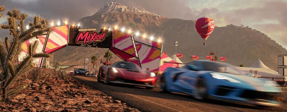 forza horizon 5 cars rcing in front of mountain
