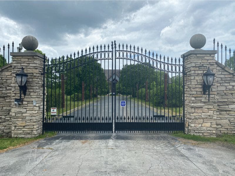 <div class="inline-image__caption"><p>The front gates to R. Kelly’s Olympia Fields home.</p></div> <div class="inline-image__credit">U.S. Attorney’s Office for the Eastern District</div>