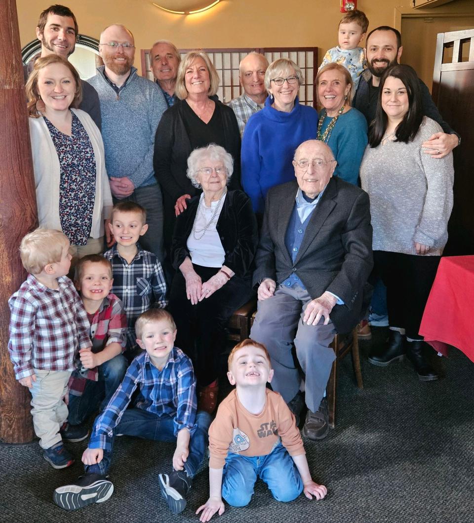 Richard and Sue Bicknell surrounded by family.