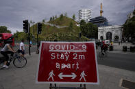 A view of the newly built "Marble Arch Mound" after it was opened to the public next to Marble Arch in London, Tuesday, July 27, 2021. The temporary installation commissioned by Westminster Council and designed by architects MVRDV has been opened as a visitor attraction to try and entice shoppers back to the adjacent Oxford Street after the coronavirus lockdowns. (AP Photo/Matt Dunham)