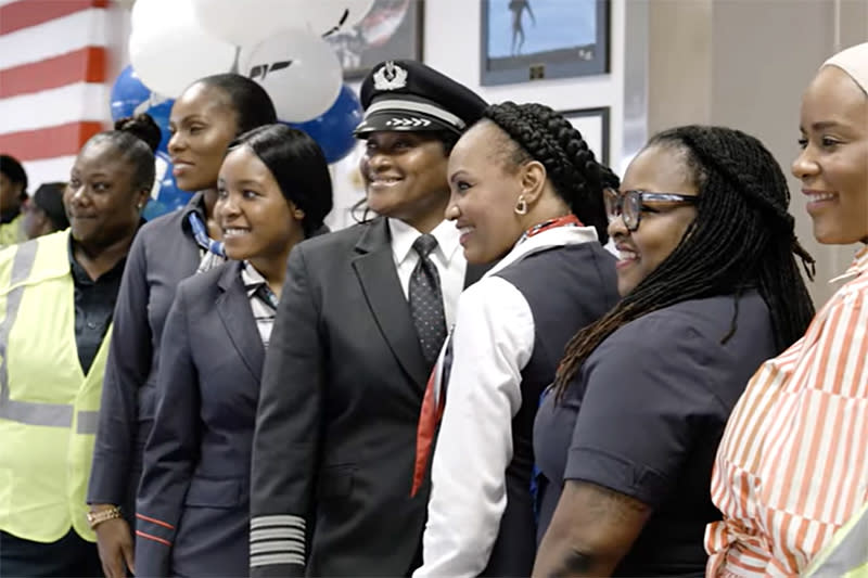 American Airline employees, an all-Black female crew, gather to celebrate Bessie Coleman. (American Airlines via YouTube)