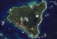 This satellite image provided by Maxar Technologies shows an overview of Nomuka in the Tonga island group on Aug. 17, 2020, before the damage from the Jan. 15, 2022, eruption. (Satellite image ©2022 Maxar Technologies via AP)