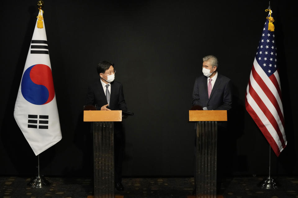 U.S. Special Representative for North Korea, Sung Kim, right, and South Korea's Special Representative for Korean Peninsula Peace and Security Affairs Noh Kyu-duk attend a briefing after their meeting at a hotel in Seoul, South Korea, Sunday, Oct. 24, 2021. (AP Photo/Ahn Young-joon, Pool)