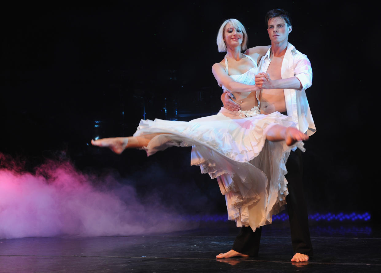 Ali Bastian and Brian Fortuna perform during photocall for their upcoming dance show - 'Burn The Floor' at Shaftesbury Theatre on July 23, 2010 in London, England.  (Photo by Ian Gavan/Getty Images)