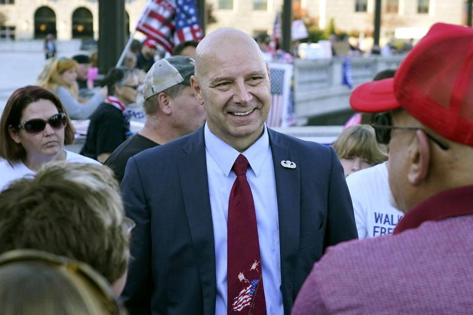 FILE - In this Nov. 7, 2020, file photo, Pennsylvania state Sen. Doug Mastriano, R-Franklin, center, speaks to supporters of President Donald Trump as they demonstrate outside the Pennsylvania State Capitol in Harrisburg, Pa., after Democrat Joe Biden defeated Trump to become 46th president of the United States. Mastriano, said in a statement Wednesday, July 7, 2021, that, as chair of the Senate Intergovernmental Operations Committee, he issued letters to several counties, requesting "information and materials needed to conduct a forensic investigation of the 2020 General Election and the 2021 Primary." (AP Photo/Julio Cortez, File)