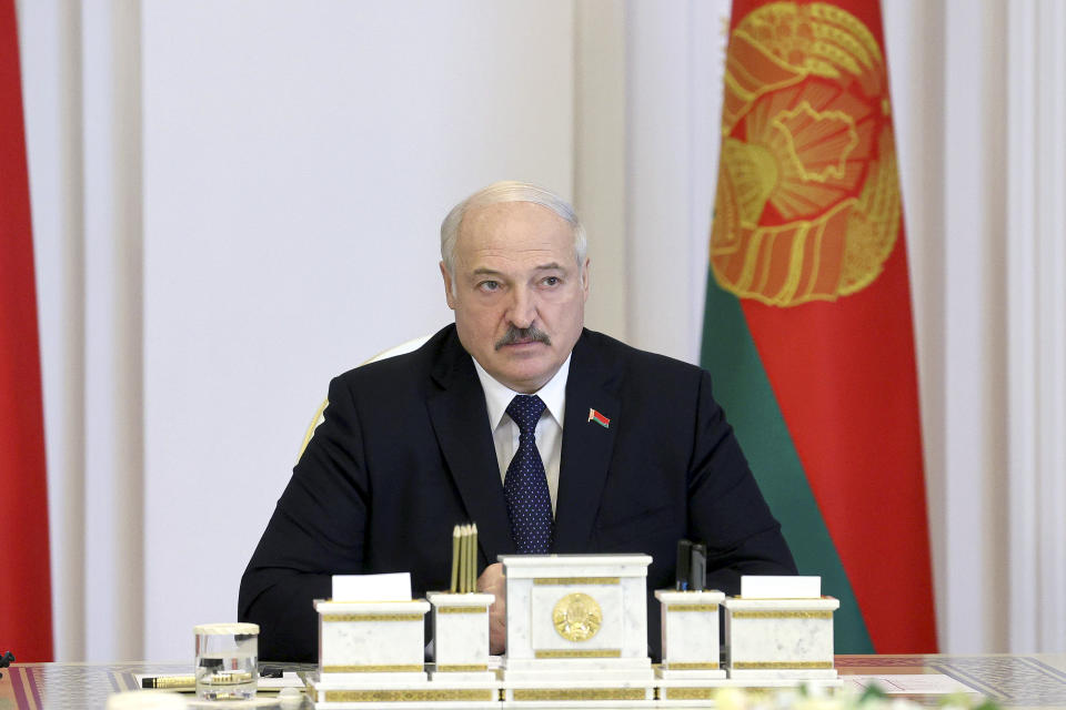 Belarus President Alexander Lukashenko speaks during a cabinet meeting in Minsk, Belarus, Friday, July 23, 2021. Belarusian authorities have ramped up raids and arrests of independent journalists and civil society activists in recent weeks. (Nikolay Petrov/BelTA Pool Photo via AP)