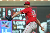 Los Angeles Angels pitcher Alex Cobb winds up duirng the first inning of the team's baseball game against the Minnesota Twins, Friday, July 23, 2021, in Minneapolis. (AP Photo/Jim Mone)