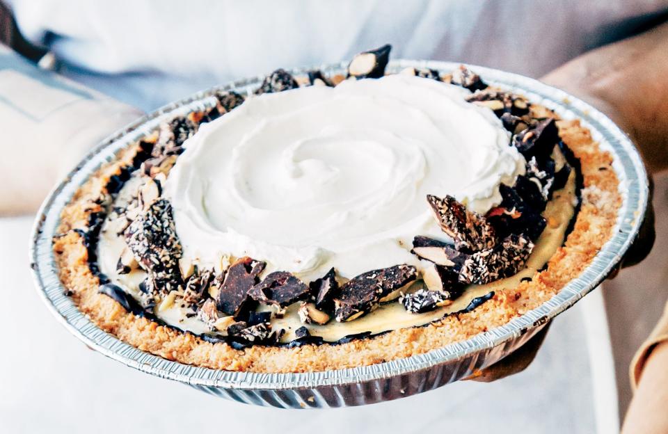 Tandem Coffee + Bakery’s coconut cream pie recipe riffs on the classic in all the right ways. Shredded coconut is a genius swap-in for cookie crumbs in the crust, and incorporating both coconut and regular milks in the custard gives it better flavor and a fluffier consistency.