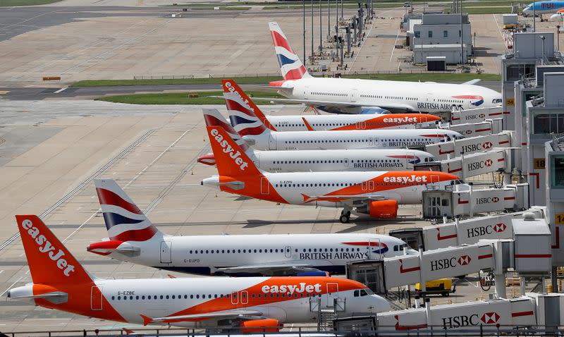 FILE PHOTO: British Airways and Easyjet aircraft are parked at the South Terminal at Gatwick Airport, in Crawley