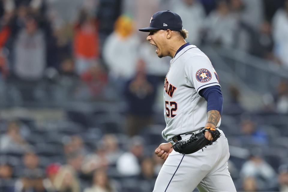 Astros relief pitcher Bryan Abreu reacts after striking out the final batter ninth inning against the Yankees during Game 3 of the ALCS at Yankee Stadium in New York.