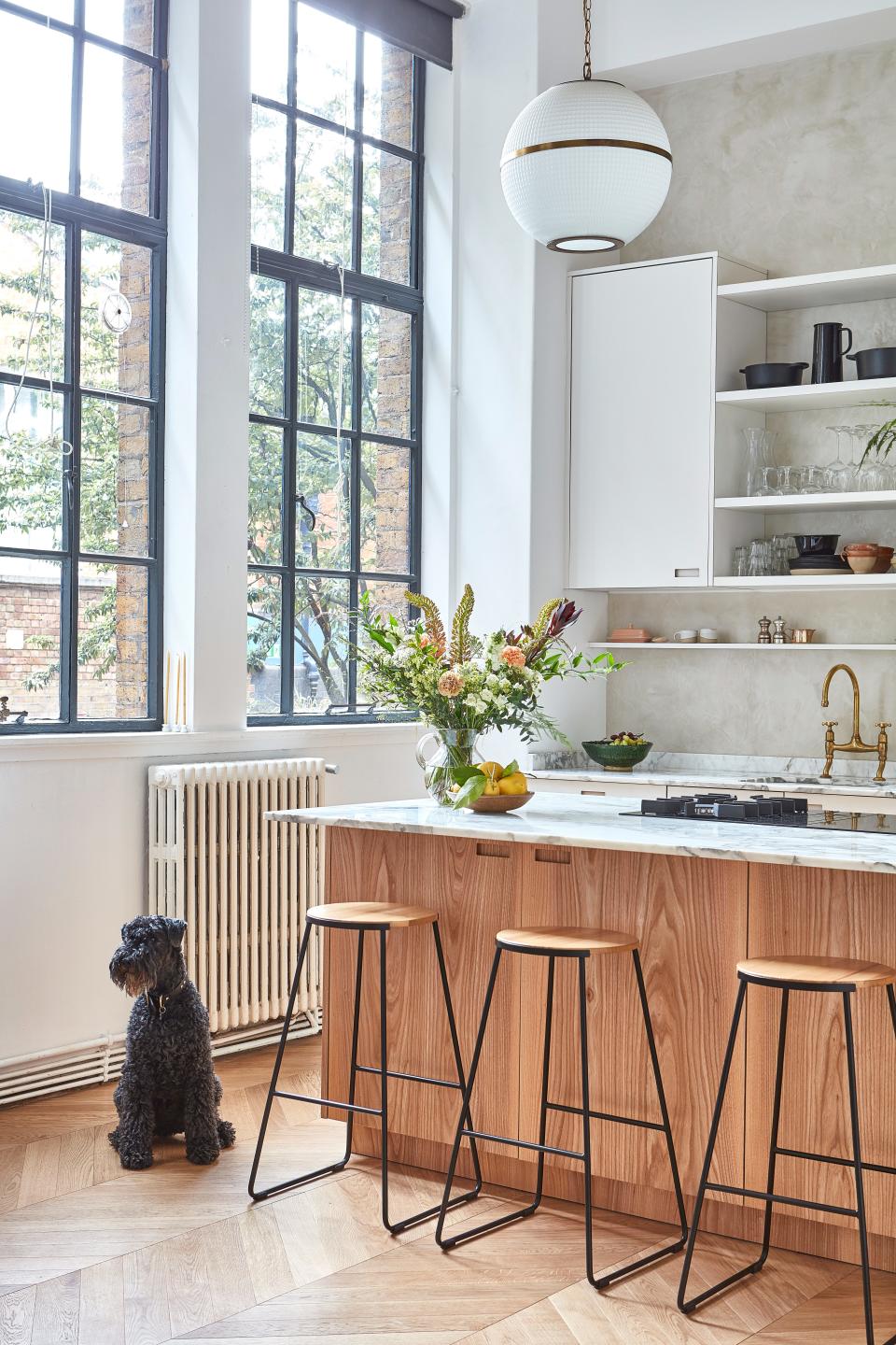 "I love the elm used for the island," says Anna. "The larder cupboard is definitely a favorite feature. I have everything in jars, so it’s always very pleasing to look at—and to use."