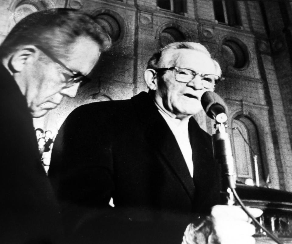 President David O. McKay, with the assistance of President N. Eldon Tanner, opens the first lighting of lights on Temple Square, Dec. 18, 1965. | Deseret News Archives