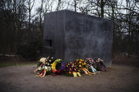 Wreaths placed at the memorial for the homosexual victims of the Nazis on the International Holocaust Remembrance Day in Berlin, Germany, Friday, Jan. 27, 2023. (AP Photo/Markus Schreiber)