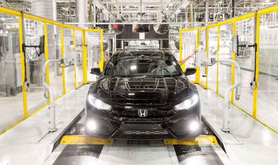 A Honda Civic sedan moves down an assembly line at Honda's assembly plant in Swindon, U.K.