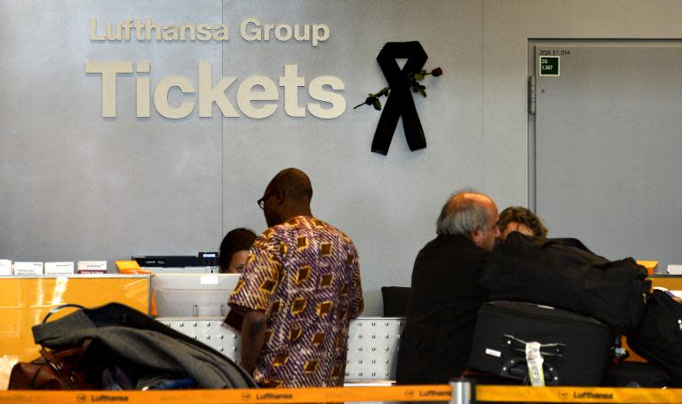 A black mourning band is seen at a ticket counter of German airline Lufthansa at the Duesseldorf airport on March 31, 2015