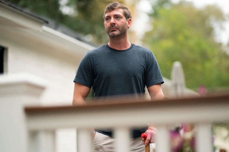 Retired Army Captain Dan Berschinski poses for a portrait at his home in Atlanta