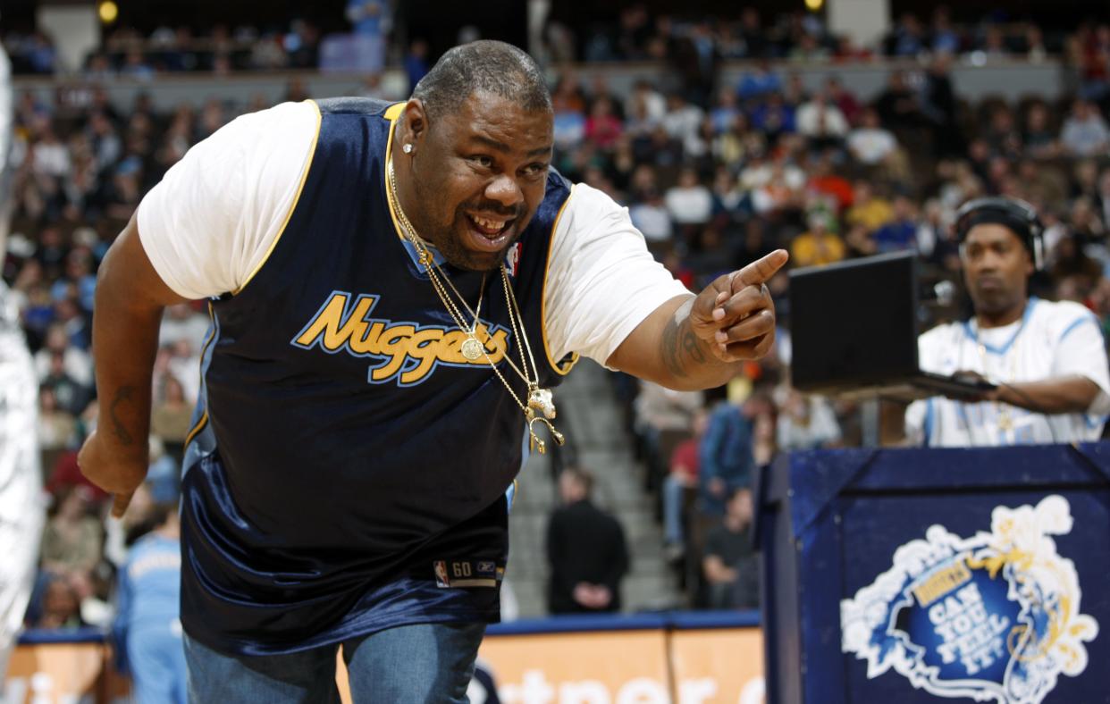 Rap singer Biz Markie performs for fans during halftime of an NBA basketball game in Denver on Dec. 12, 2009. 