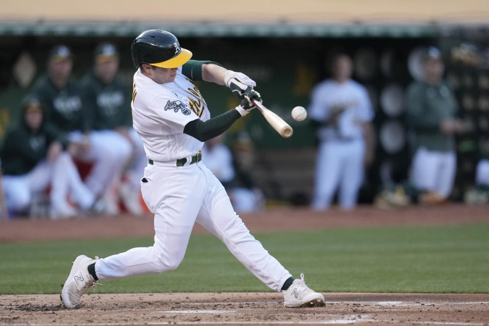 Oakland Athletics' Nick Allen hits an RBI double against the Texas Rangers during the third inning of a baseball game in Oakland, Calif., Monday, Aug. 7, 2023. (AP Photo/Jeff Chiu)