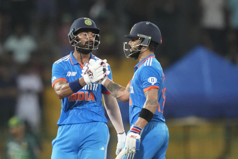 India's Virat Kohli and KL Rahul cheer themselves during the Asia Cup cricket match between India and Pakistan in Colombo, Sri Lanka on Monday, Sept.11, 2023. (AP Photo/Eranga Jayawardena)