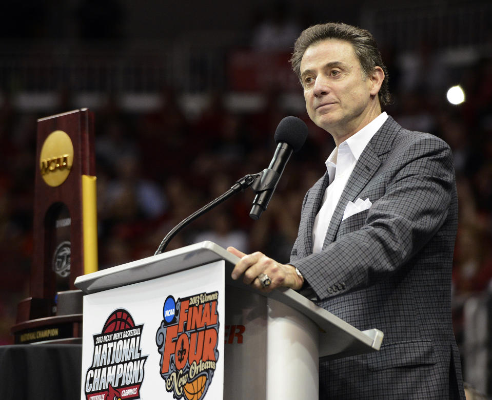 Reading between the lines, it’s clear that Rick Pitino’s Louisville program has been caught up in an FBI probe that rocked the college basketball world Tuesday. (AP)