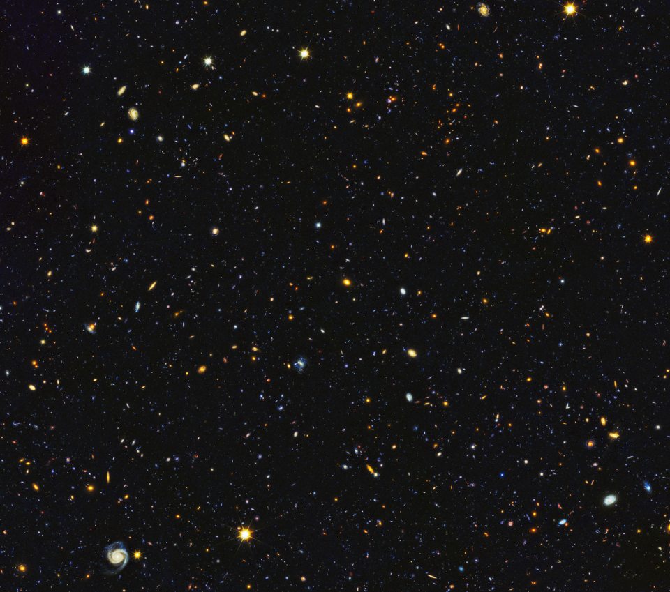 15,000 galaxies appear as small dots and blots in this NASA photograph of the nighttime sky. Each galaxy contains billions of stars. <a href="https://astrobiology.nasa.gov/news/15000-galaxies-in-one-image/" rel="nofollow noopener" target="_blank" data-ylk="slk:NASA/ESA/P.Oesch/M.Montes;elm:context_link;itc:0;sec:content-canvas" class="link ">NASA/ESA/P.Oesch/M.Montes</a>