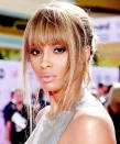 <p>A full fringe with longer, side pieces like Ciara's cut from the Billboard Music Awards is a flattering technique of framing your face shape. </p>