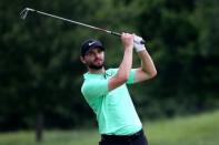 Jul 2, 2017; Potomac, MD, USA; Kyle Stanley watches his shot on the 15th hole during the final round of the Quicken Loans National golf tournament at TPC Potomac at Avenel Farm. Mandatory Credit: Peter Casey-USA TODAY Sports