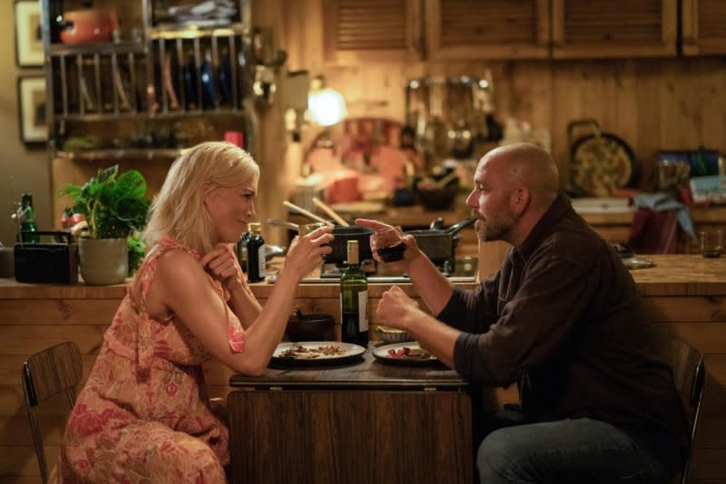 Rebecca (Hannah Waddingham) romances a houseboat owner (Matteo van der Grijn) in "Ted Lasso." The boat set was created in a London studio. Photo courtesy of Apple TV+