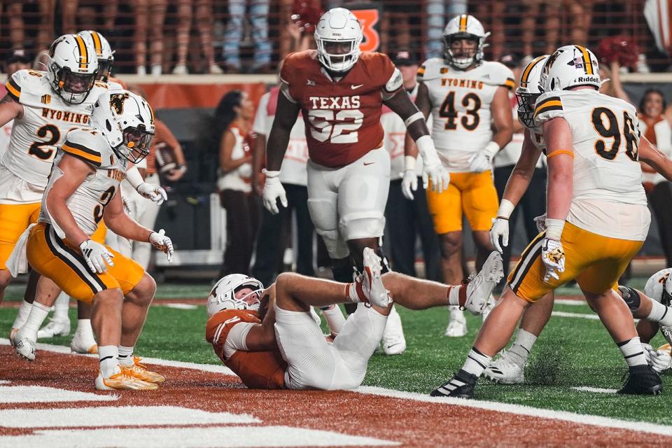 Texas quarterback Quinn Ewers scores on a 5-yard keeper in the fourth quarter. He leads all Longhorns in rushing touchdowns this season.