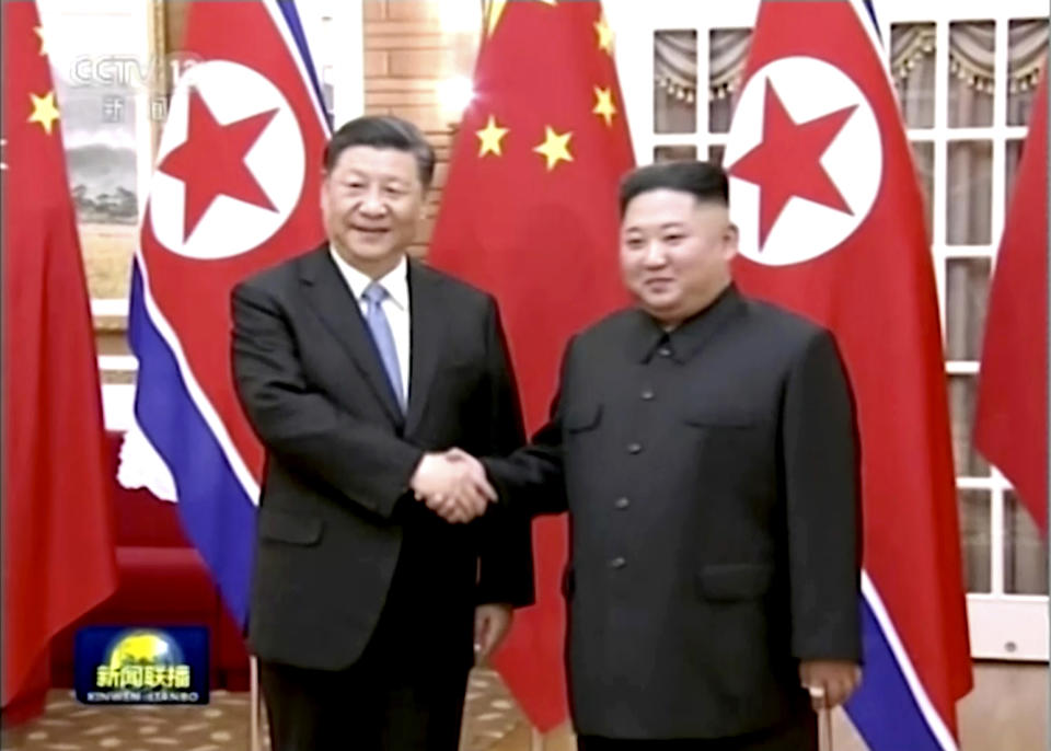 In this image taken from a video footage run by China's CCTV, Chinese President Xi Jinping, left, and North Korean leader Kim Jong Un, right, shake hands before their meeting in Pyongyang, North Korea, Thursday, June 20, 2019. Xi and Kim met in the North's capital on Thursday, their fifth meeting in 15 months, with stalled nuclear negotiations with Washington expected to be on the agenda. (CCTV via AP)