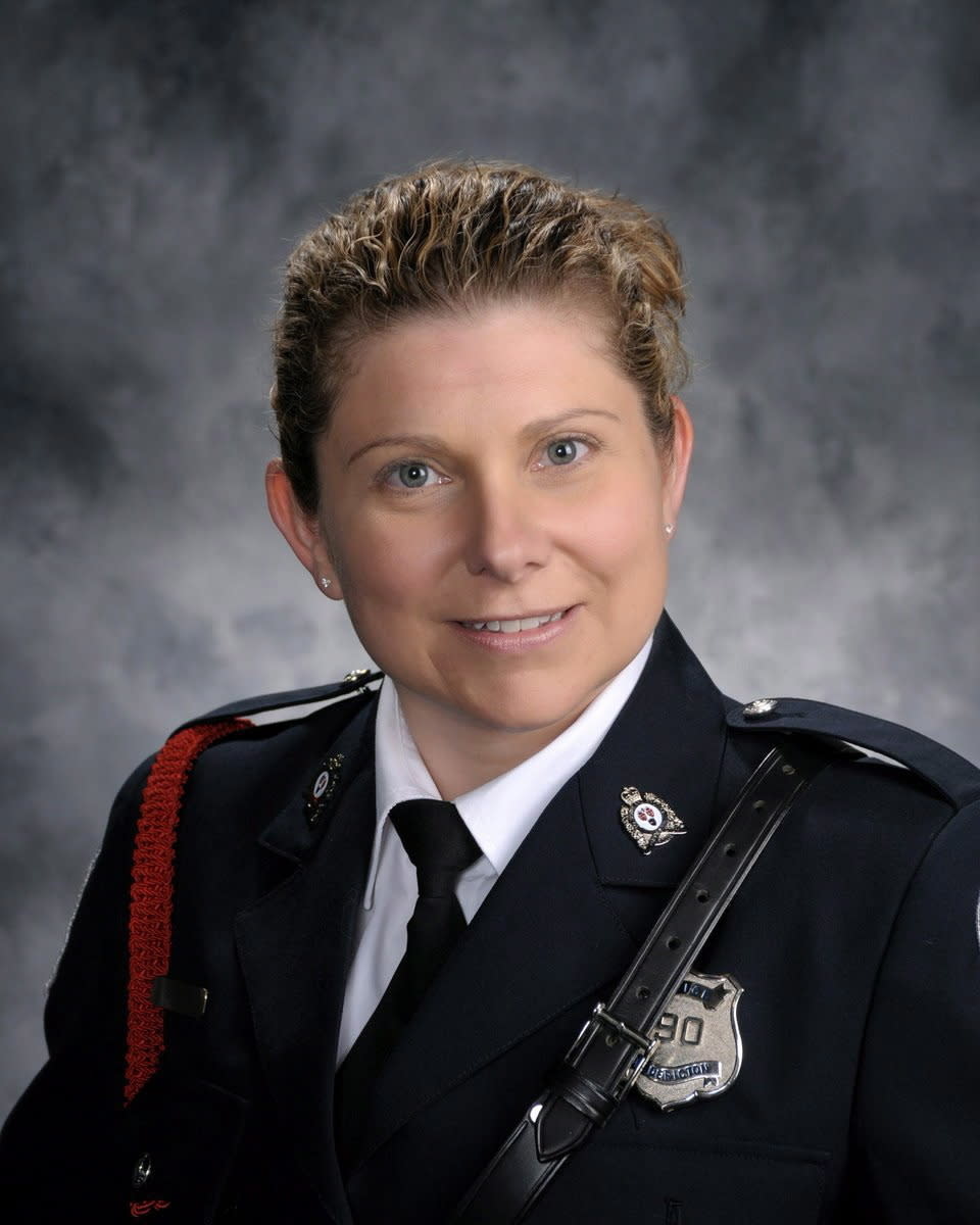 This undated photo provided by Fredericton Police Force shows Sara Burns. A shooting in a small Canadian city Friday, Aug. 10, 2018, that left several people dead, including Burns and another police officer who were responding to call of shots fired, struck a nerve in a country that has been roiled in recent months by several instances of mass violence. (Fredericton Police Force via AP)