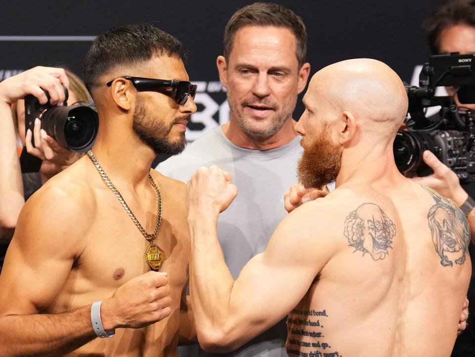 Yair Rodriguez (left) faces off with Josh Emmett (Zuffa LLC via Getty Images)