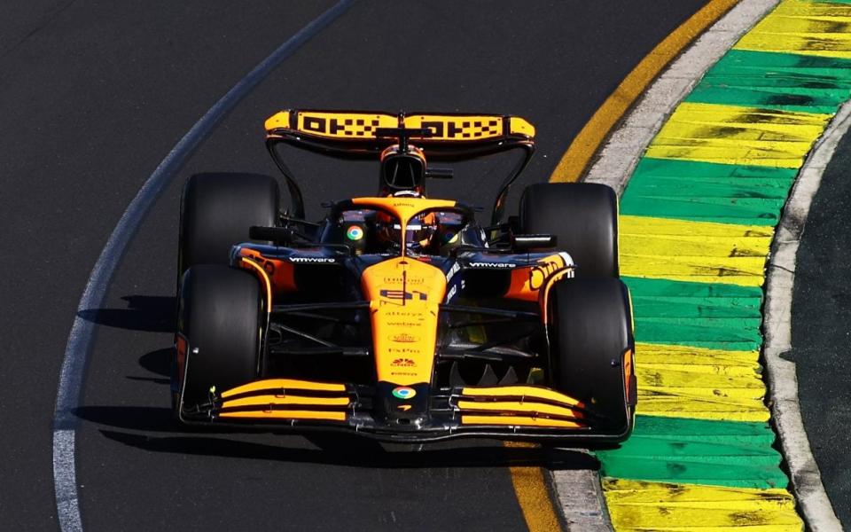 Oscar Piastri of Australia driving the (81) McLaren MCL38 Mercedes leads George Russell of Great Britain driving the (63) Mercedes AMG Petronas F1 Team W15 during the F1 Grand Prix of Australia at Albert Park Circuit on March 24, 2024 in Melbourne, Australia