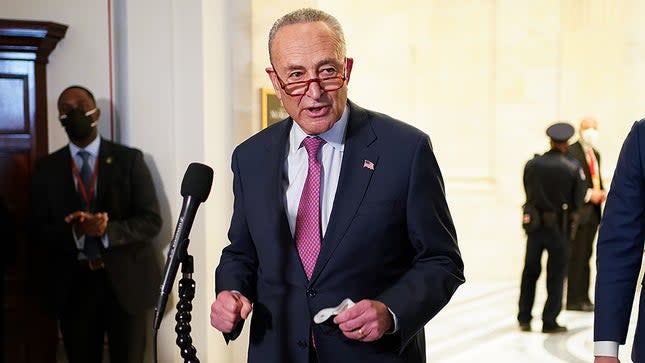 Majority Leader C Schumer (D-N.Y.) speaks to reporters after hearing from President Biden at a Democratic caucus luncheon at the Senate Russell Office building to discuss voting rights and filibuster reform on Thursday, January 13, 2022.