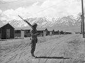 <p>An American soldier guards a Japanese internment camp at Manzanar, Calif., May 23, 1943. (AP Photo) </p>