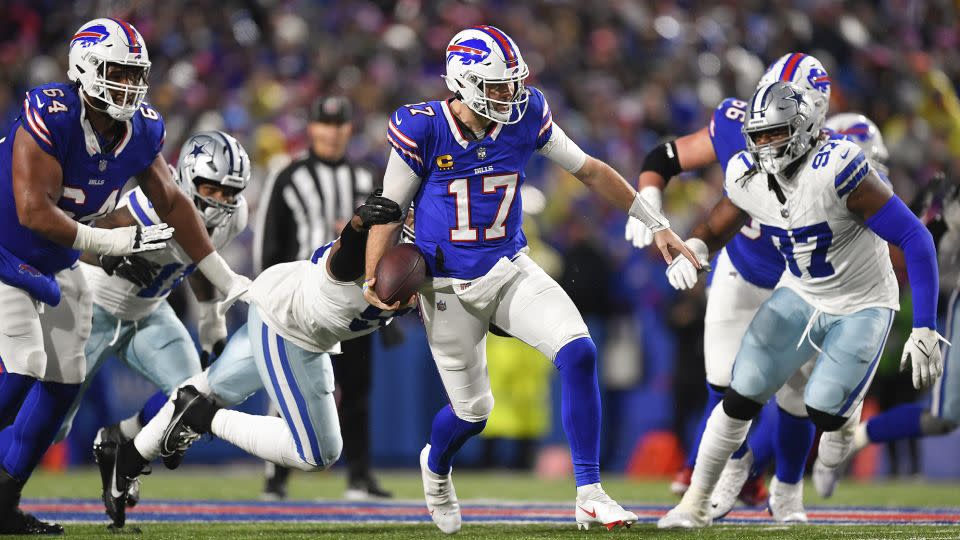 Buffalo Bills quarterback Josh Allen carries the ball against the Dallas Cowboys. - Adrian Kraus/AP