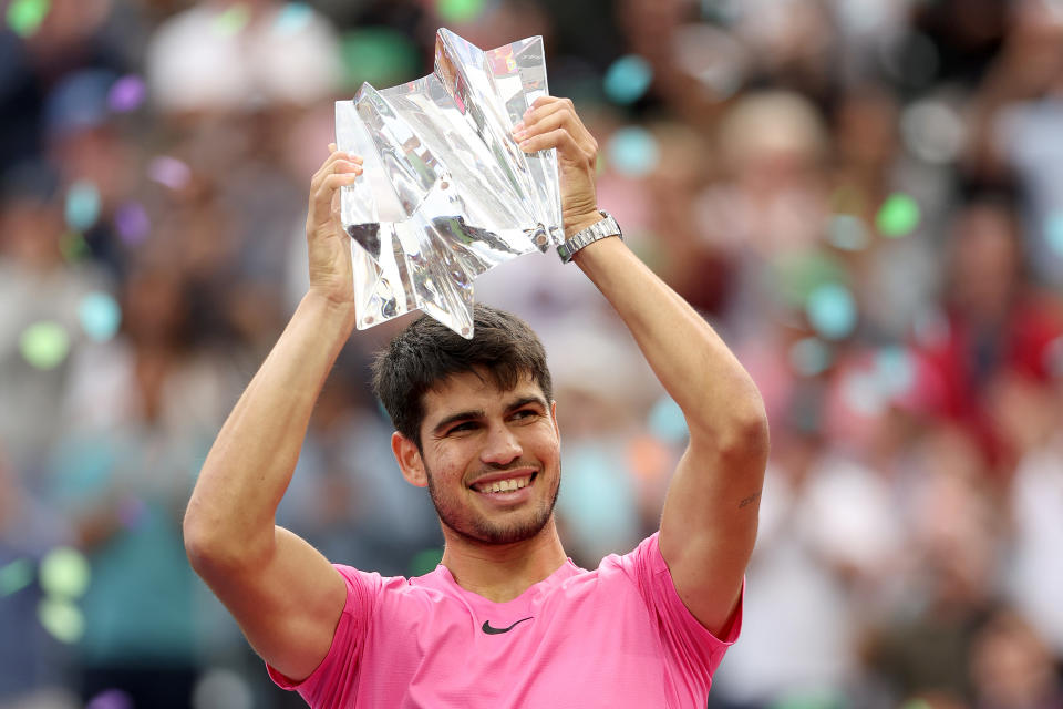 Carlos Alcaraz, pictured here with the trophy after defeating Daniil Medvedev in the Indian Wells final.