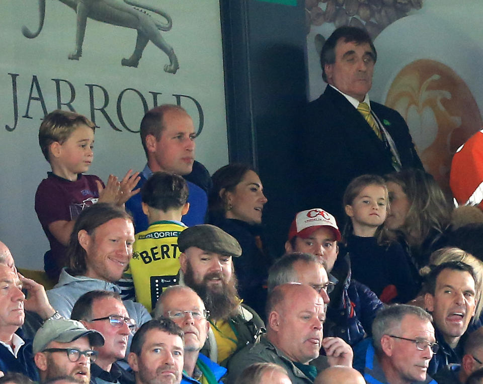 Prince George of Cambridge,  Prince William, Duke of Cambridge and Catherine, Duchess of Cambridge and Princess Charlotte of Cambridge are seen in the stands during the Premier League match between Norwich City and Aston Villa at Carrow Road on October 05, 2019 in Norwich, United Kingdom. 