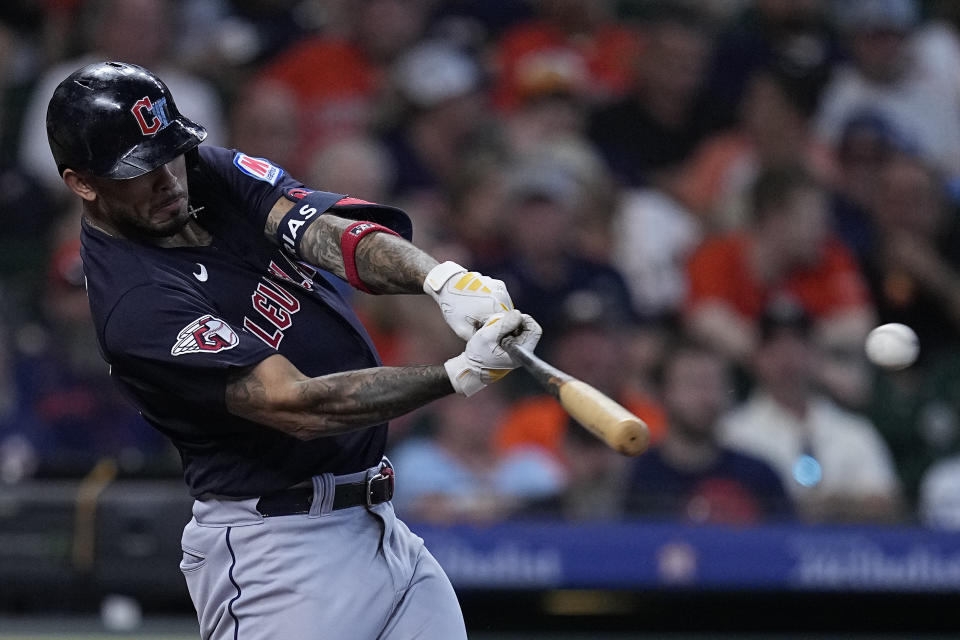 Cleveland Guardians' Gabriel Arias hits a two-run double during the second inning of a baseball game against the Houston Astros, Wednesday, Aug. 2, 2023, in Houston. (AP Photo/Kevin M. Cox)