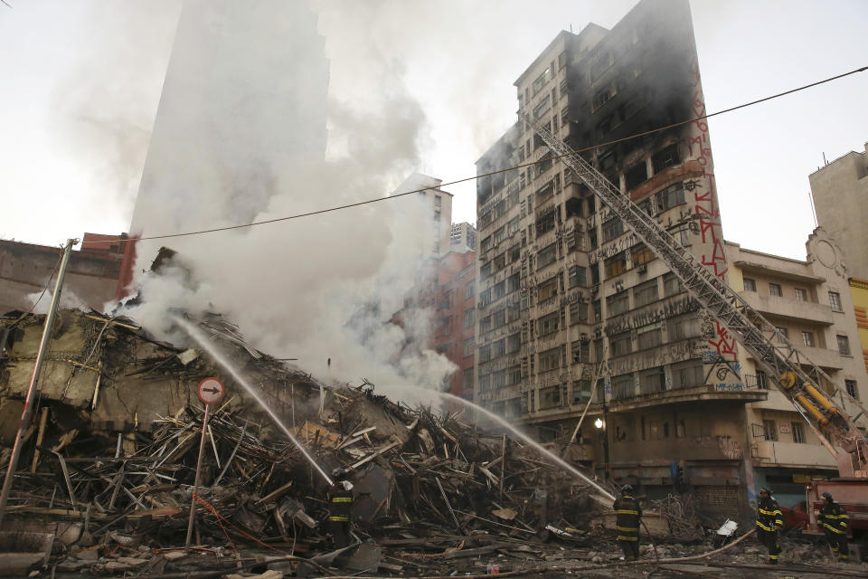 Burning high-rise collapses