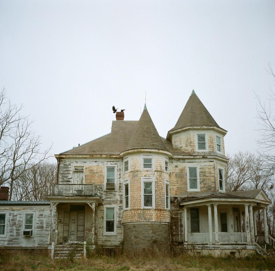 The exterior of an abandoned house.