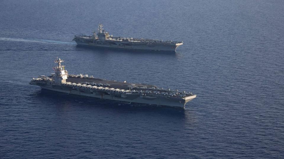 The Gerald R. Ford, front, and Dwight D. Eisenhower aircraft carriers sail in formation in the Mediterranean Sea on Nov. 3, 2023. (MC2 Jacob Mattingly/US Navy)