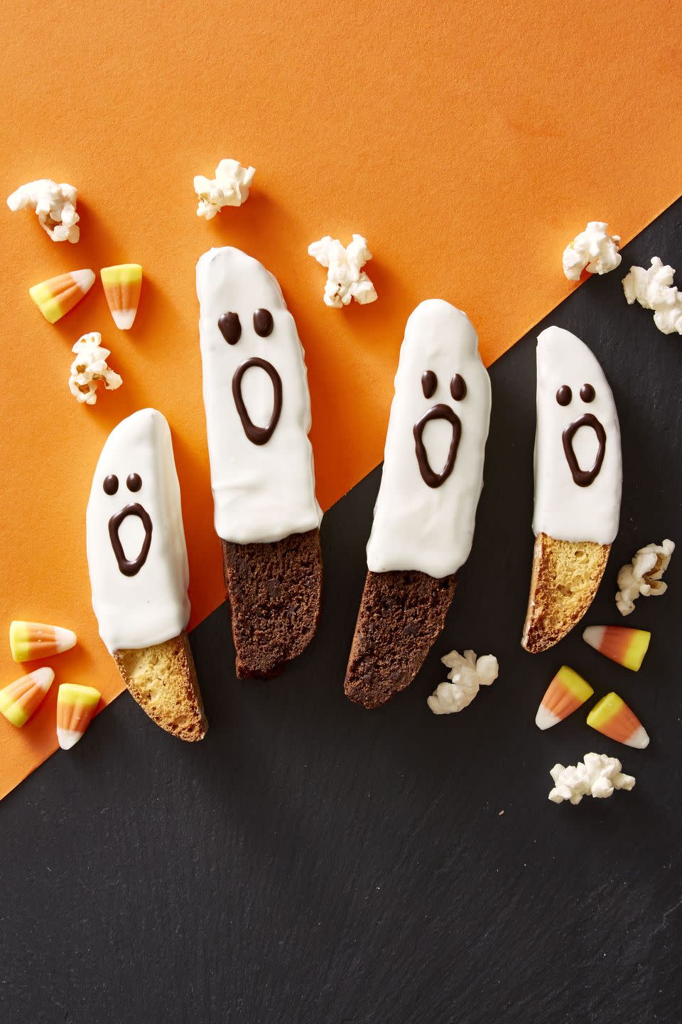 <p>Dip store-bought biscotti into white, milk or dark chocolate for an instant dose of ghostly magic. <a href="https://www.goodhousekeeping.com/food-recipes/a46101/boo-scotti-recipe/" rel="nofollow noopener" target="_blank" data-ylk="slk:;elm:context_link;itc:0;sec:content-canvas" class="link "><br><em><br></em></a><a href="https://www.goodhousekeeping.com/food-recipes/a46101/boo-scotti-recipe/" rel="nofollow noopener" target="_blank" data-ylk="slk:Get the recipe for Boo-scotti »;elm:context_link;itc:0;sec:content-canvas" class="link "><em>Get the recipe for Boo-scotti »</em></a></p>