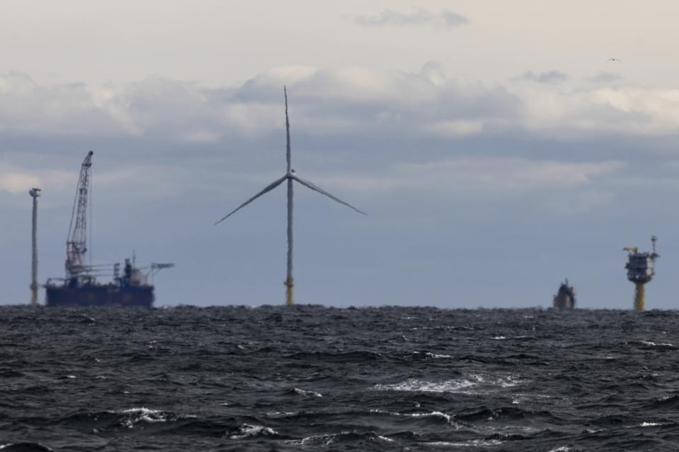 FILE - The first operating South Fork Wind farm turbine is visible, Dec. 7, 2023, east of Montauk Point, N.Y. Unfounded claims about offshore wind threatening whales have surfaced as a flashpoint in the fight over the future of renewable energy. (AP Photo/Julia Nikhinson, File)